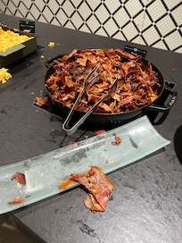 Leathery, bone-dry bacon that could double as shoe soles