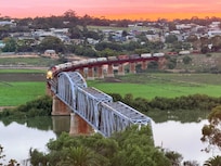 Pacific National crossing the bridge at Murray Bridge. View from my 5th floor suite at the Bridgeport.