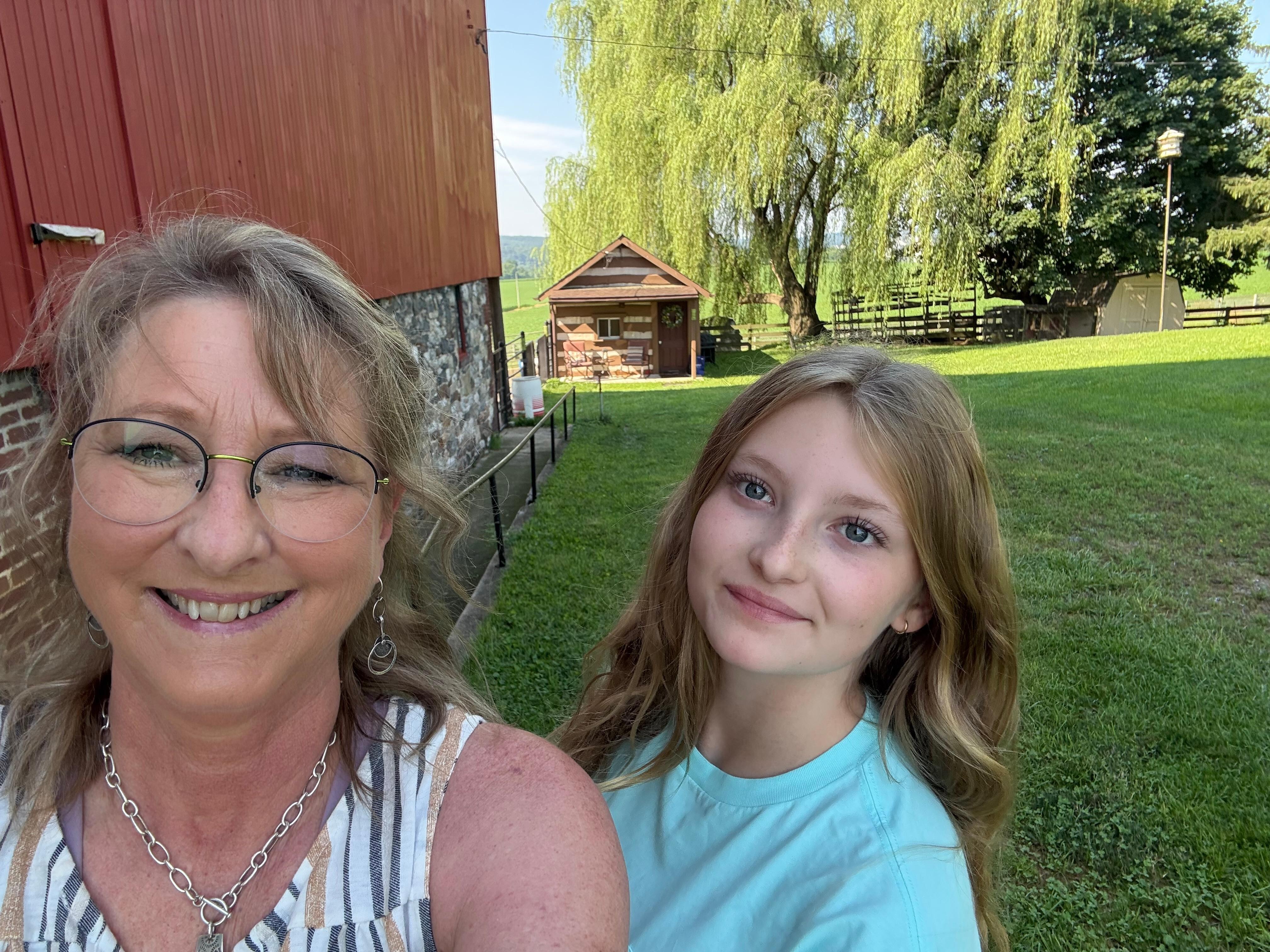 Cabin is in the background. 