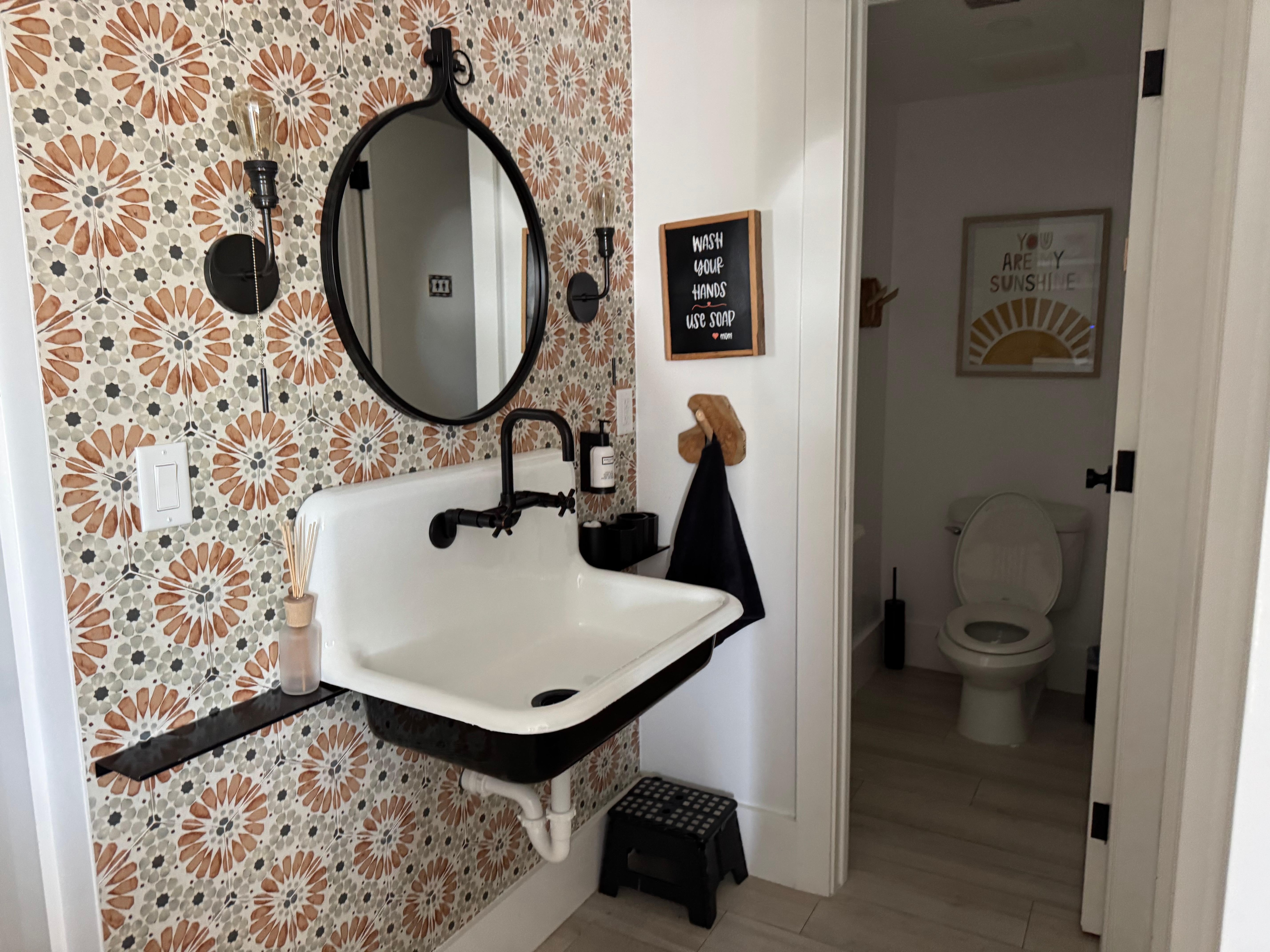 One of the 3 cute bathrooms 