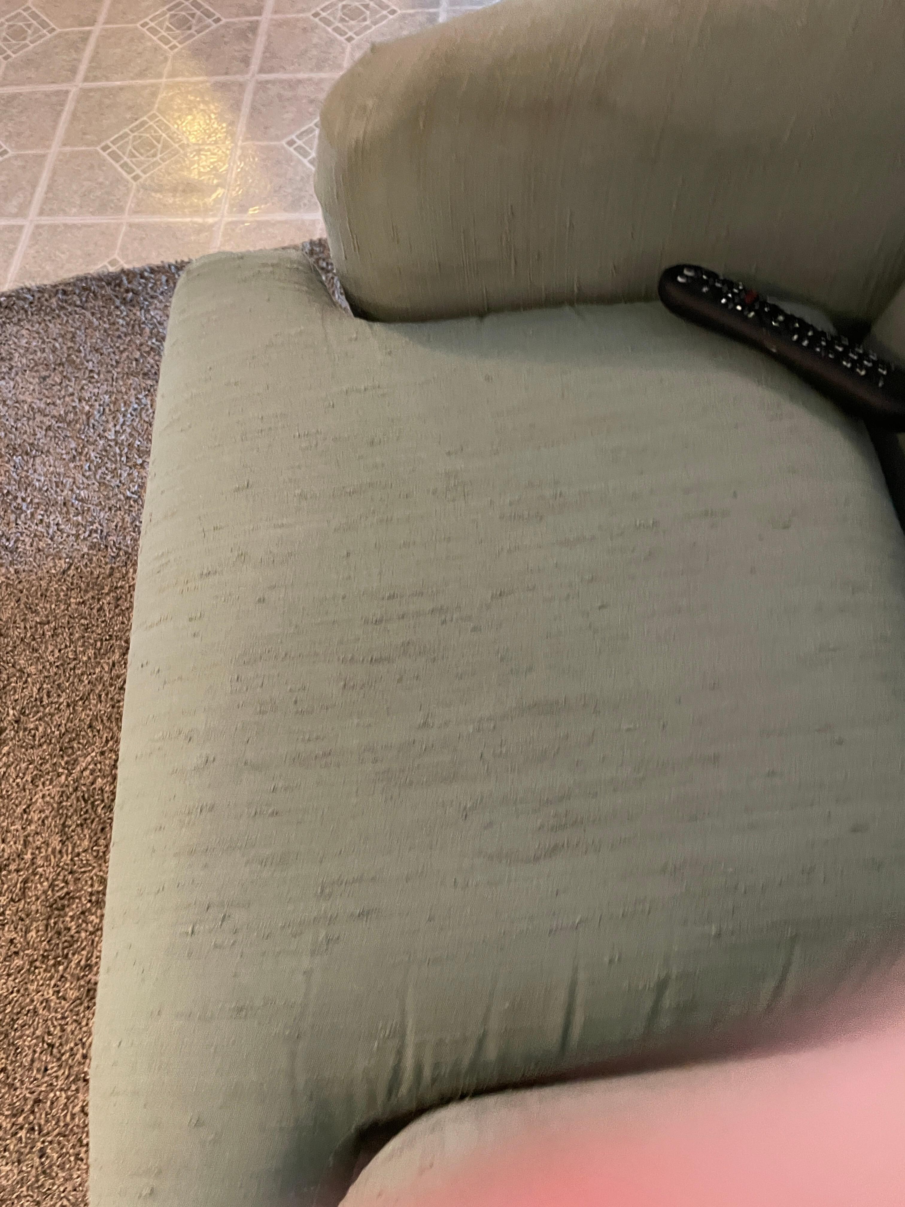 A chair with a stain.