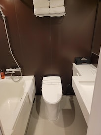 Narrow bathroom, clean, but really humid and stuffy