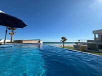 In the pool looking at the ocean
