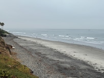 Early morning walk along the beach near the home.
