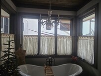 Master bath with see through curtains anyone can see in even from the street!