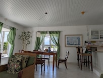 The living room and dining room area