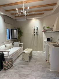 Living room/kitchen with balcony!