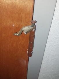 Broken hotel door hindge