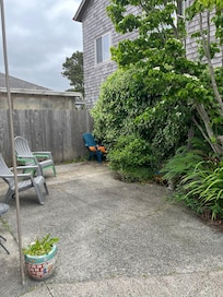 fully fenced, private back courtyard and...