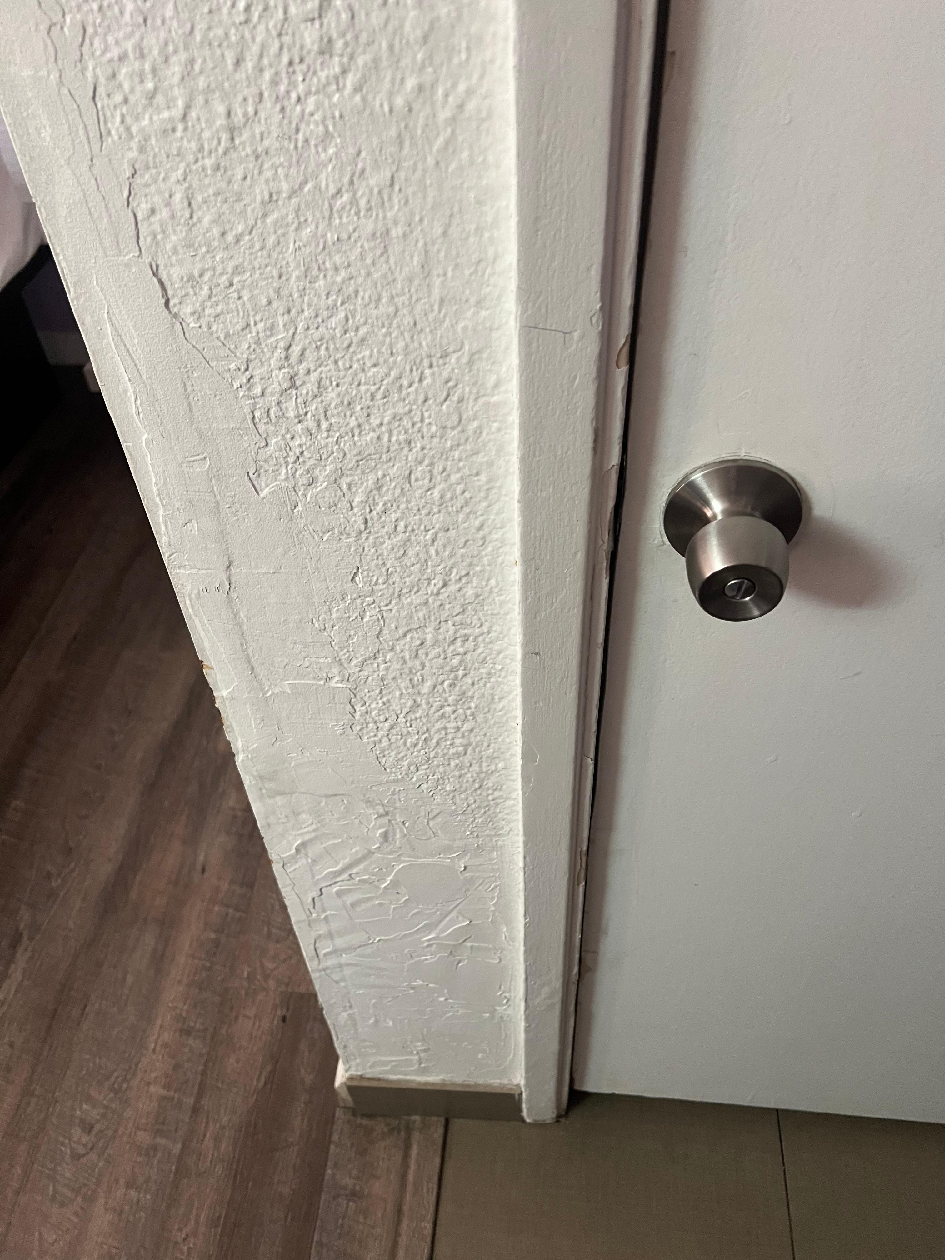 Chipped paint on the wall