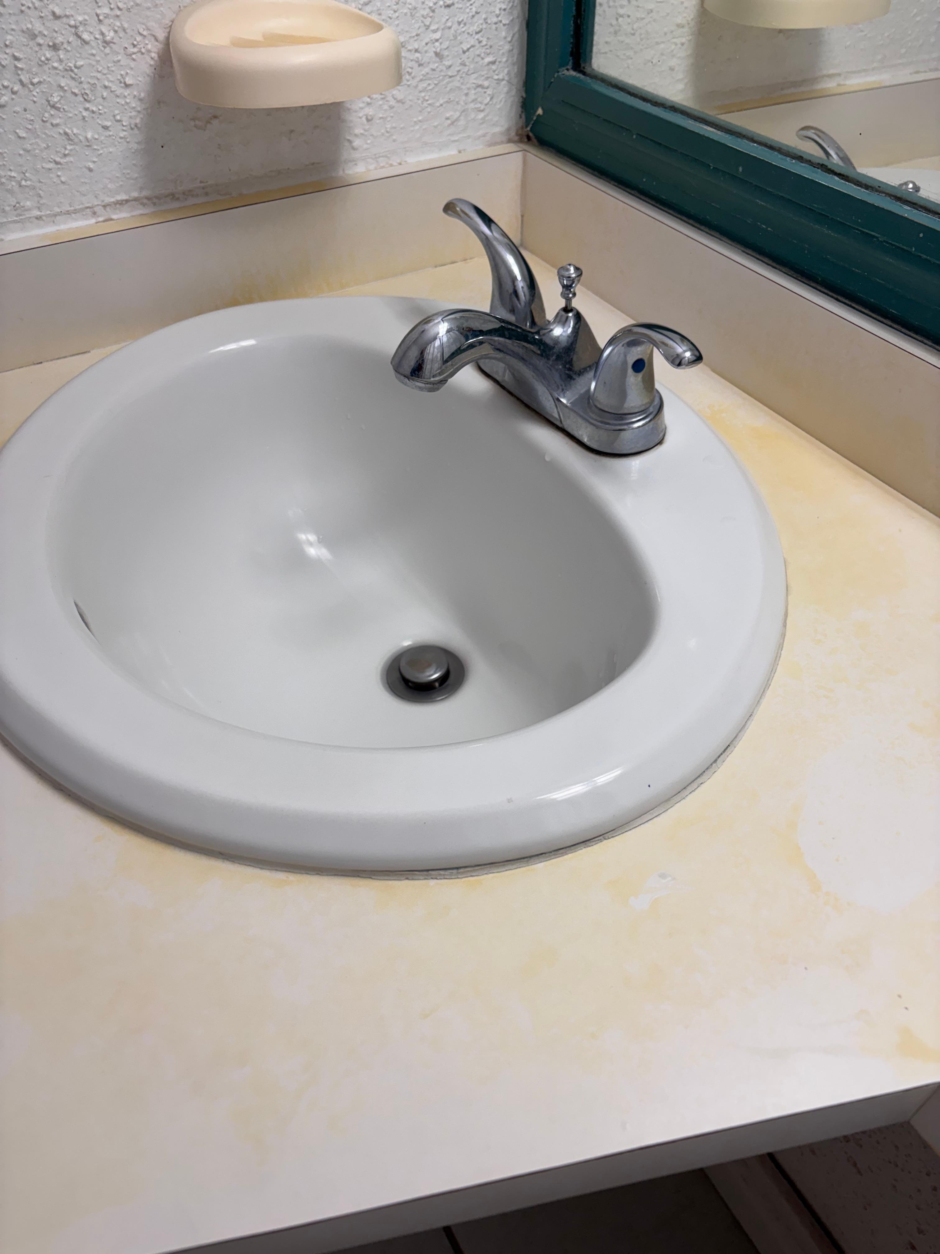 Stains around the sink. It’s supposed to be white!