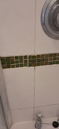 Dirty tiles in bathroom