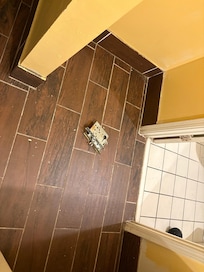 Dirty and random stuff on floor and counters.