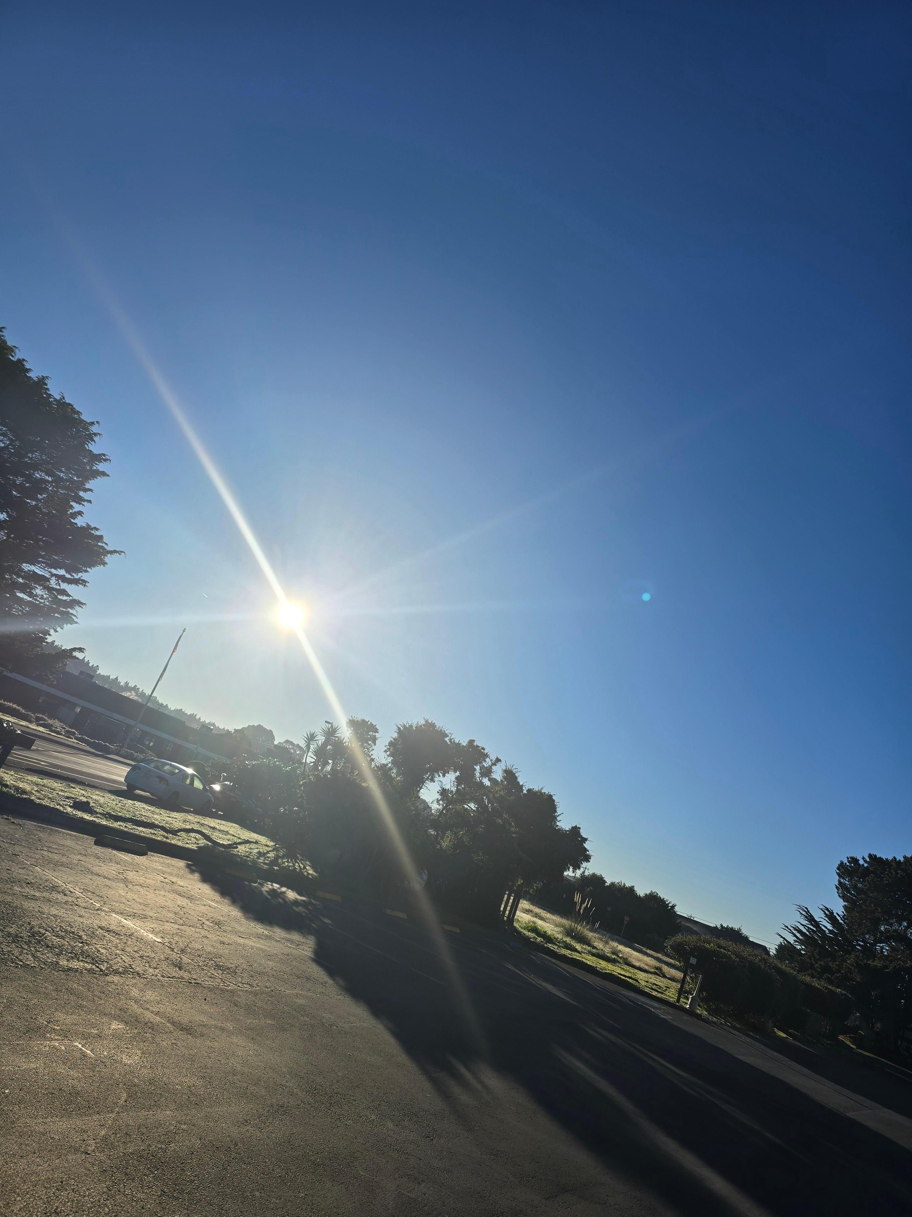Morning sunshine from behind the hotel. Quiet street, beautiful view. 