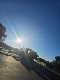 Morning sunshine from behind the hotel. Quiet street, beautiful view.