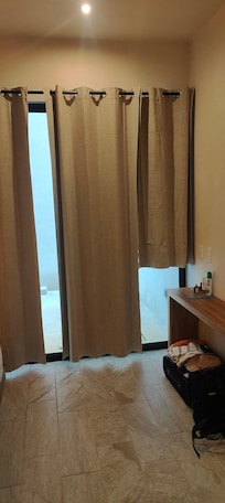 Two curtains don't cover the doors so a 3rd added half the length