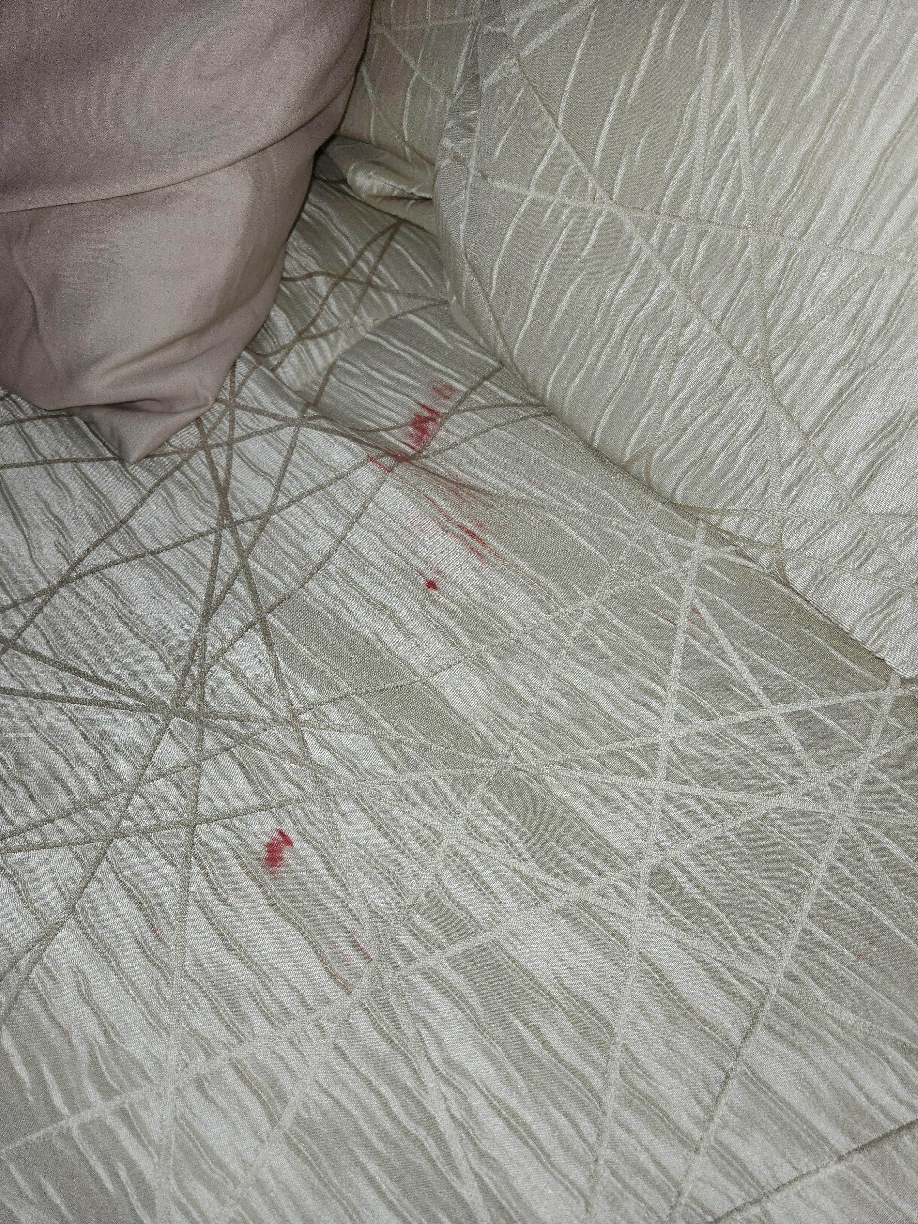Nail polish on the bedspreads
