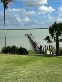 lush lawn with lots of outdoor seating options.