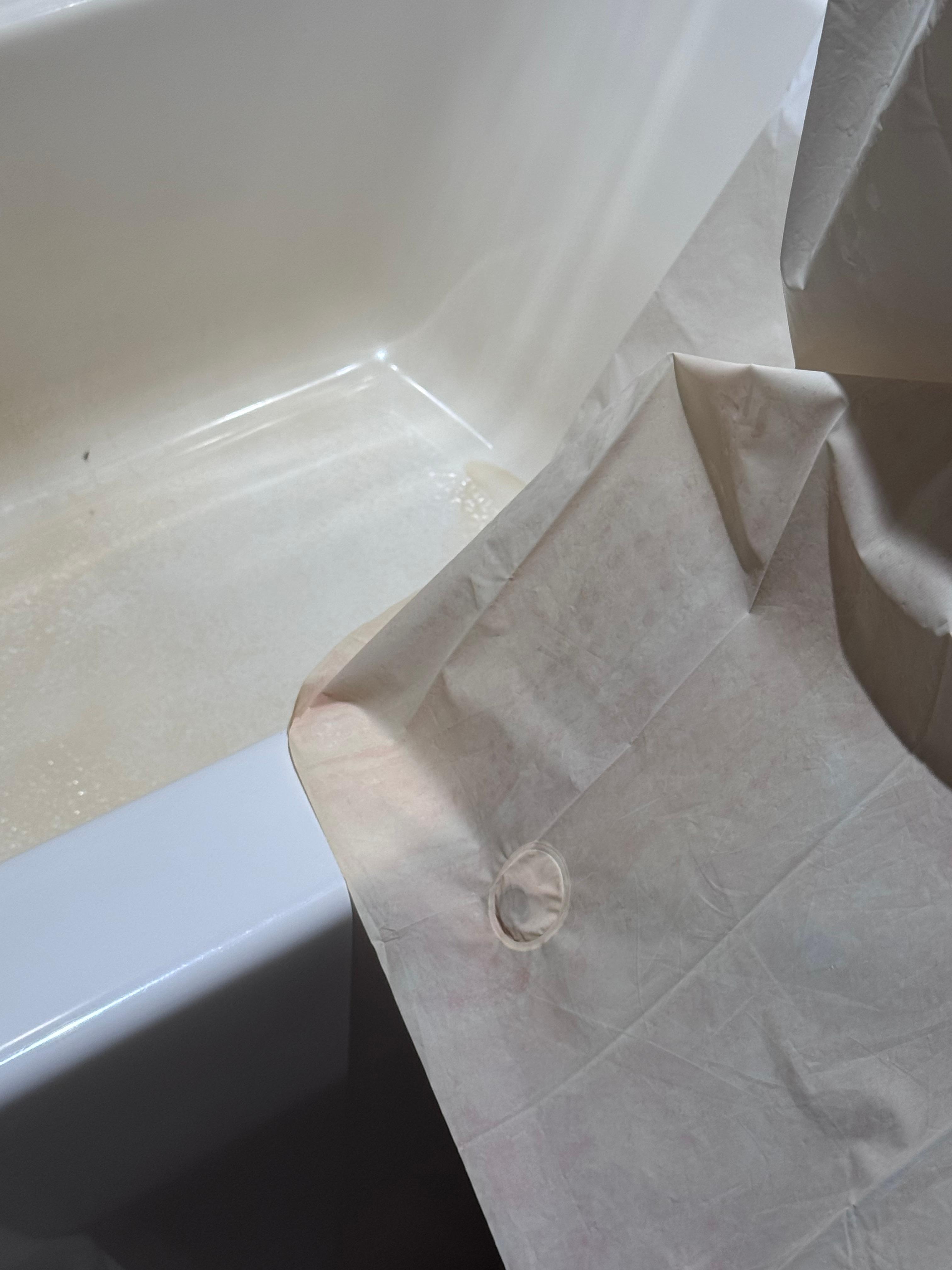 Red mold on the shower curtain