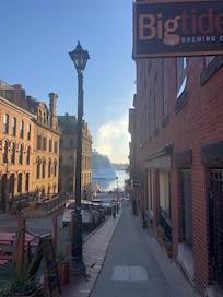 A cruise ship leaving the harbour down the street from the accommodation.
