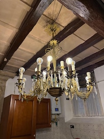 Chandelier over dining table.