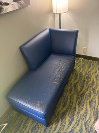 Hotel furniture looks like it was pulled from a dumpster. It belongs in a dumpster, not in a supposedly clean room.