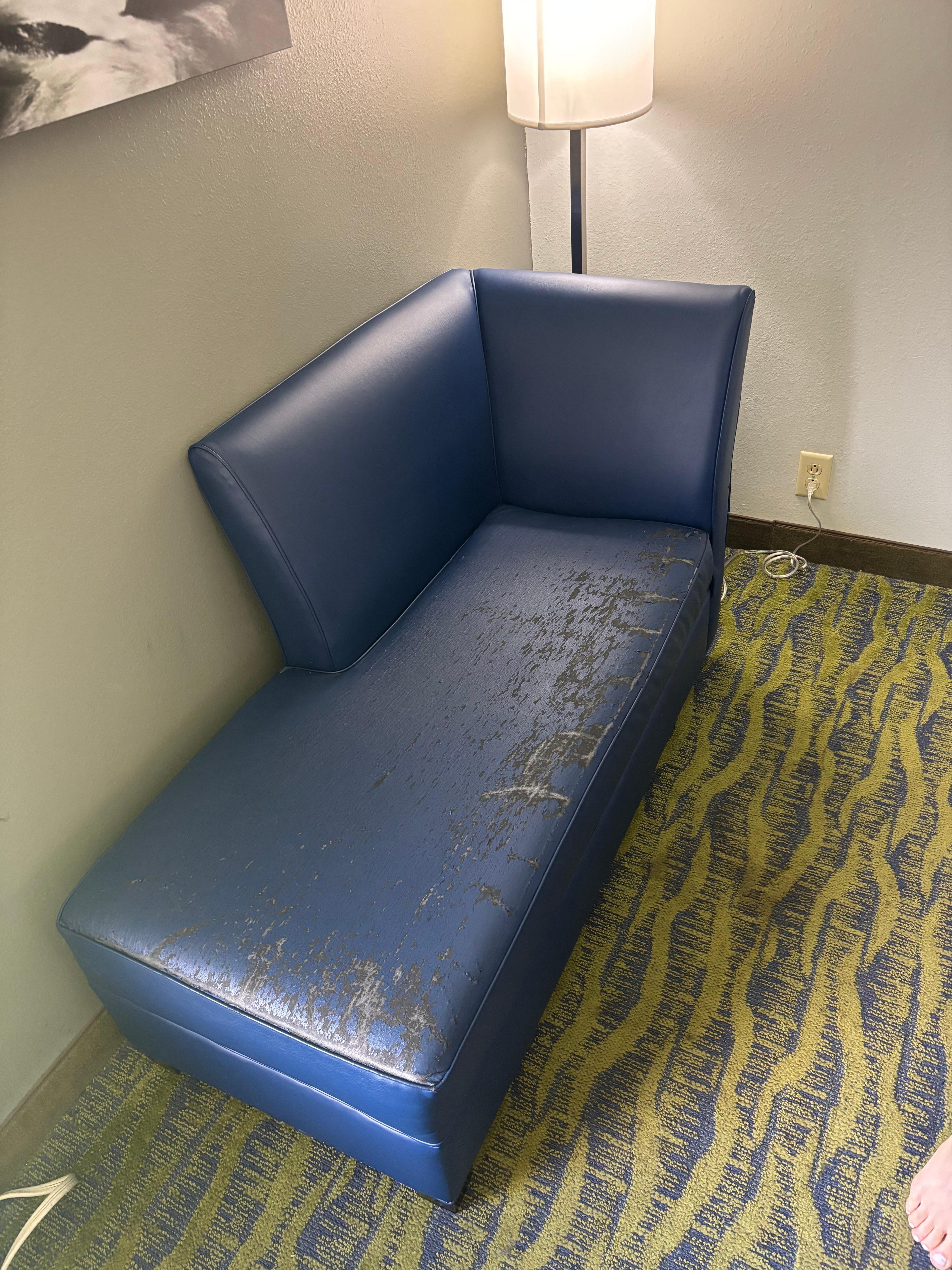 Hotel furniture looks like it was pulled from a dumpster. It belongs in a dumpster, not in a supposedly clean room.