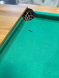 Ripped felt on pool table