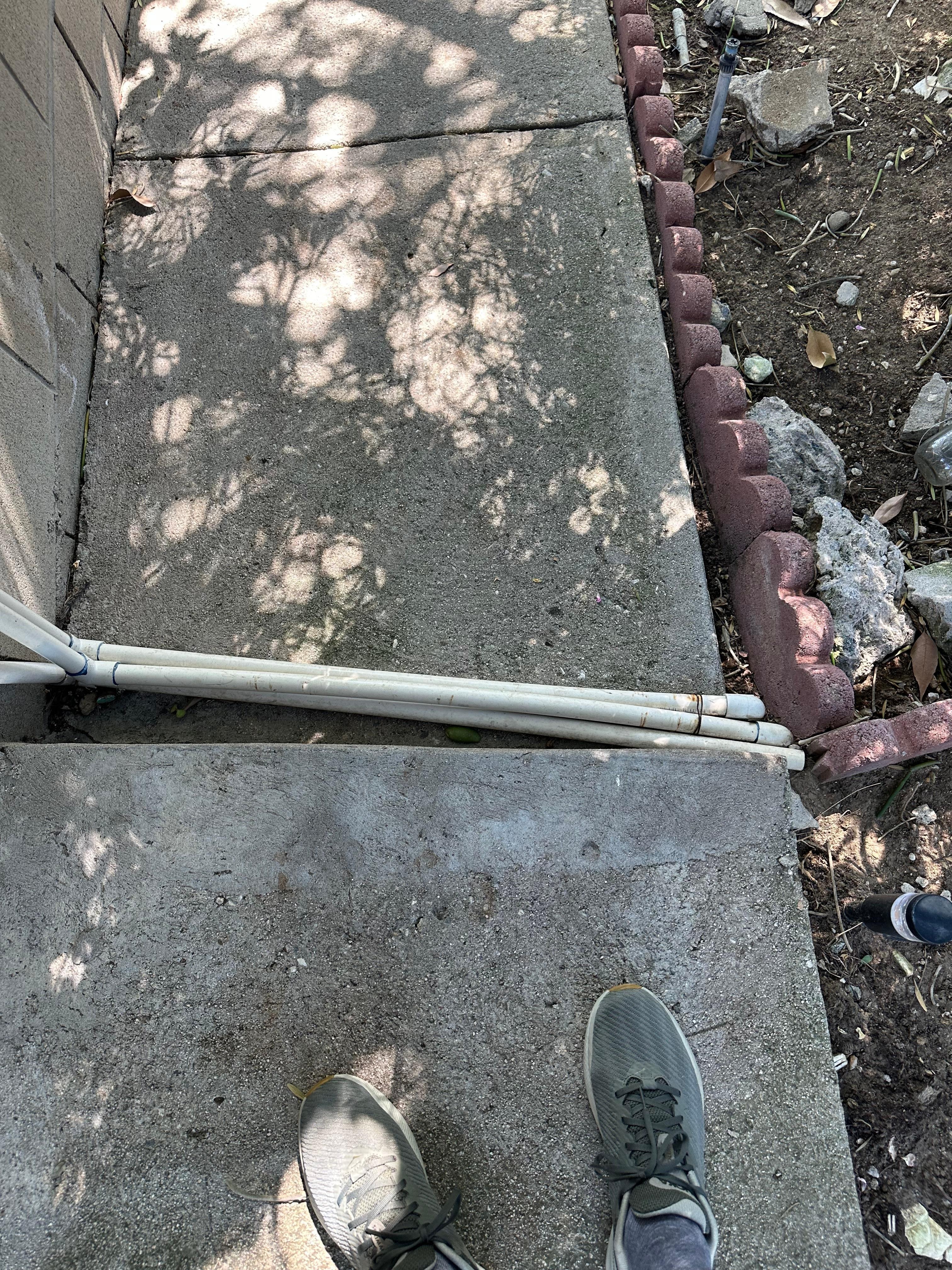 Pipes that cross over the stairs