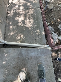 Pipes that cross over the stairs