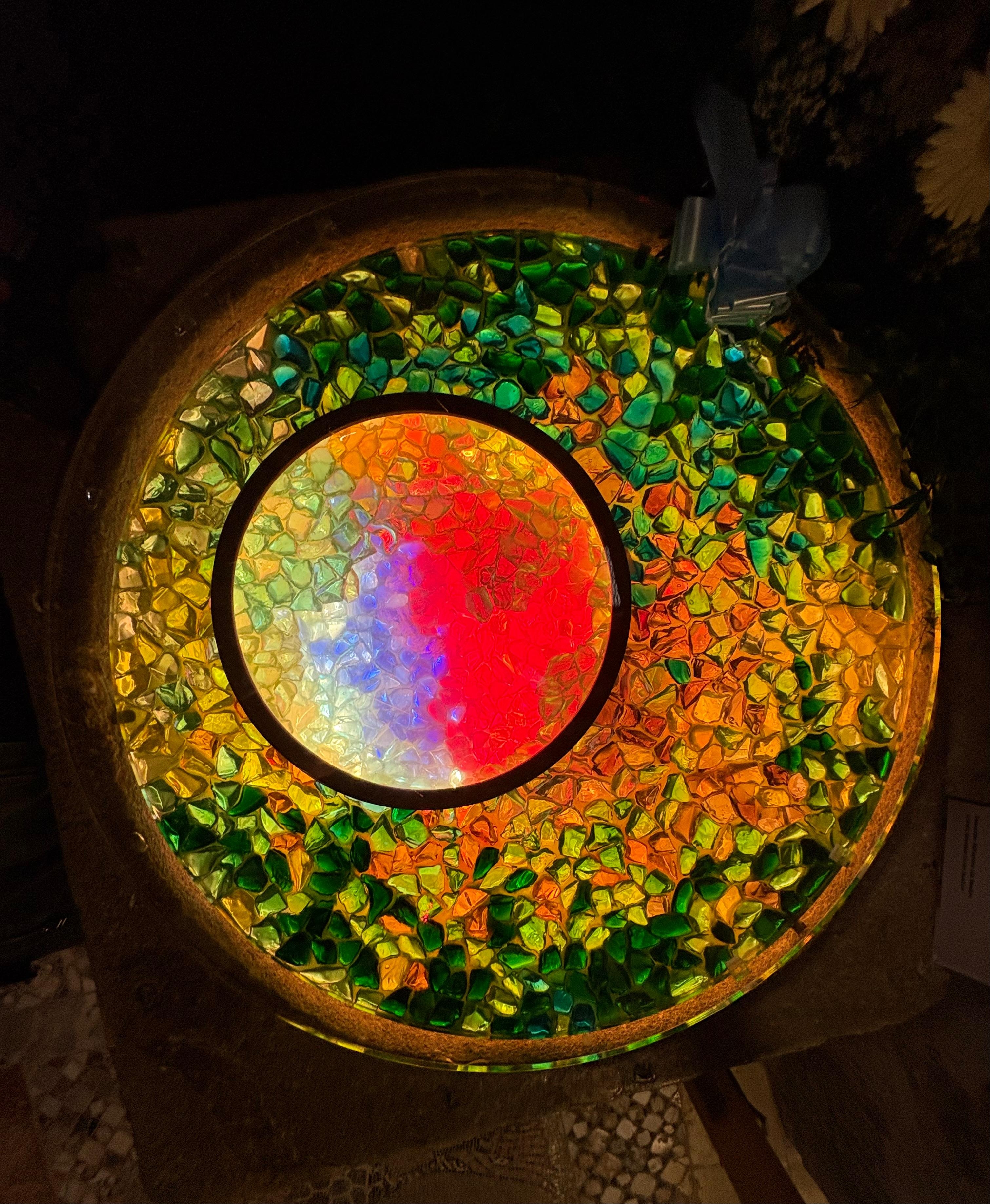 Baptismal font from the second century with colored glass 