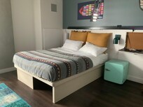 The hotel rooms were designed in a postmodern fashion with minimalist undertones