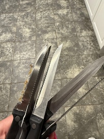 This disgusting knife was stuck inside the knife block. It was obviously dirty & so gross.