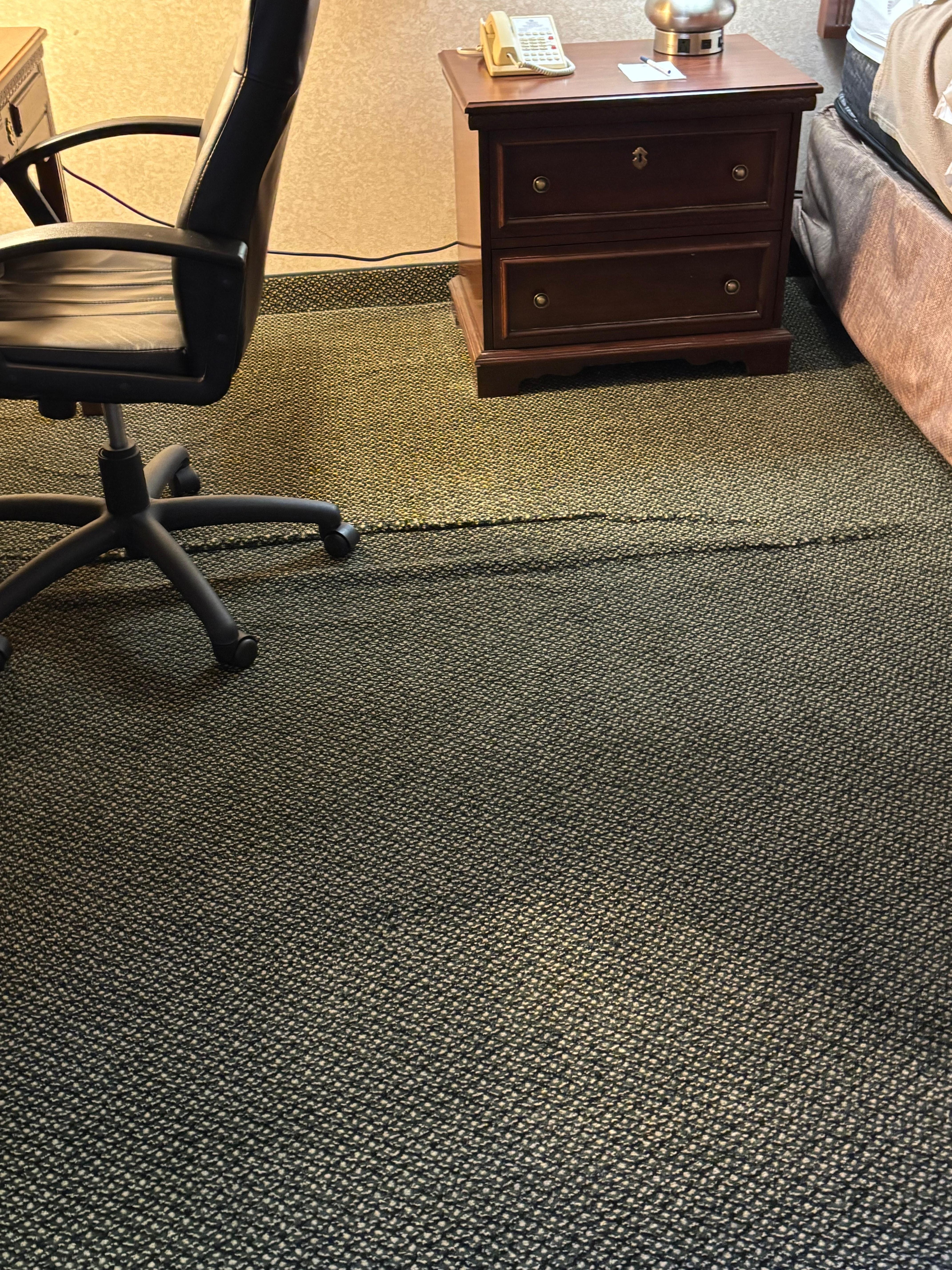 Tripping hazard, impairs use oif chair at desk from desk to under bed.