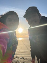 Grandson and wife lovin the beach