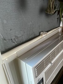 Insulation around window unit