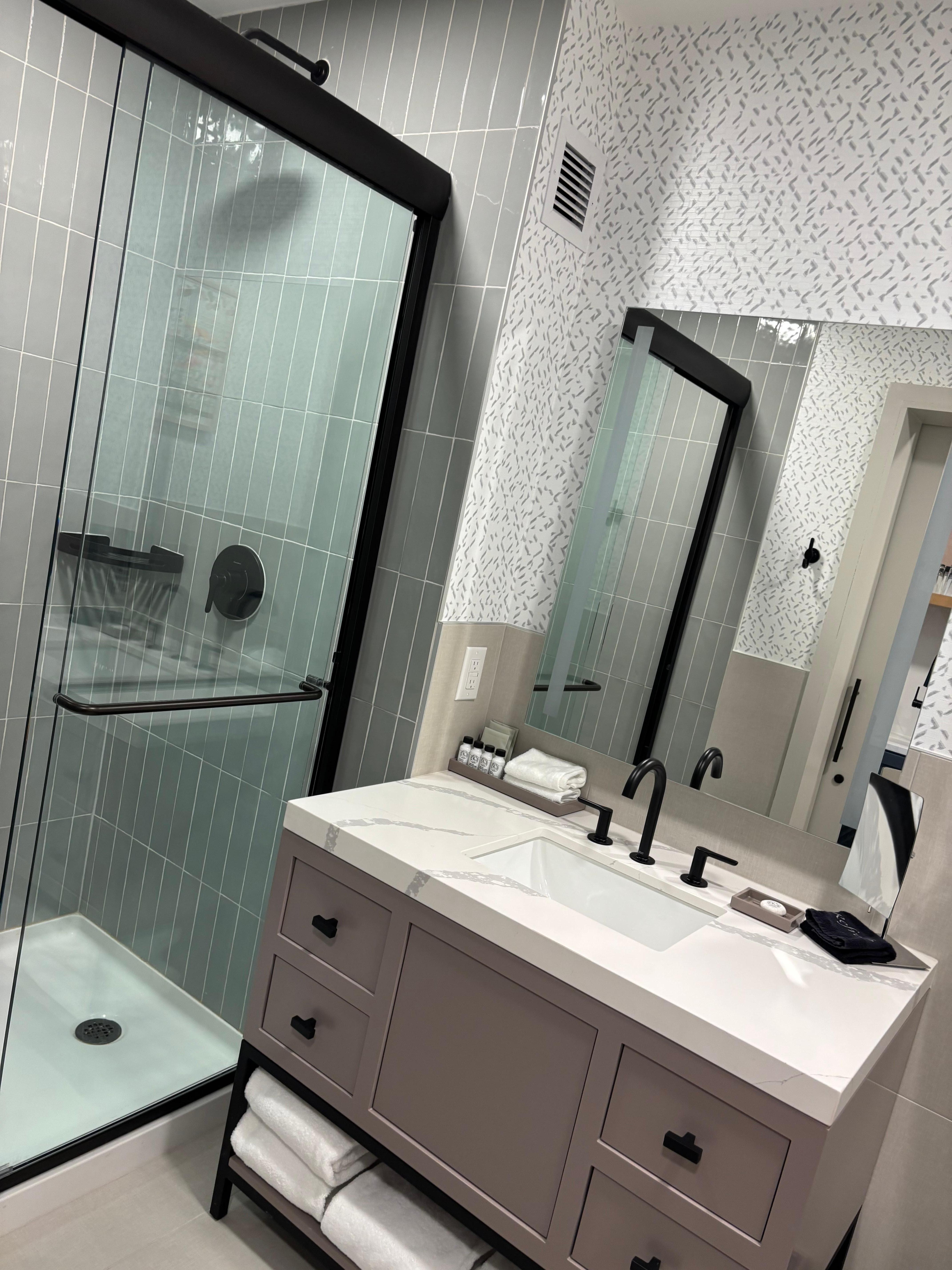 Bathroom was nice and there was a full size fridge and kitchenette in the room. 