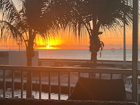 Sunrise from screened in porch.