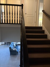 Staircase leading to bedrooms upstairs
