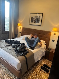 Sorry about our stuff piled on the bed haha but the bed was very comfortable