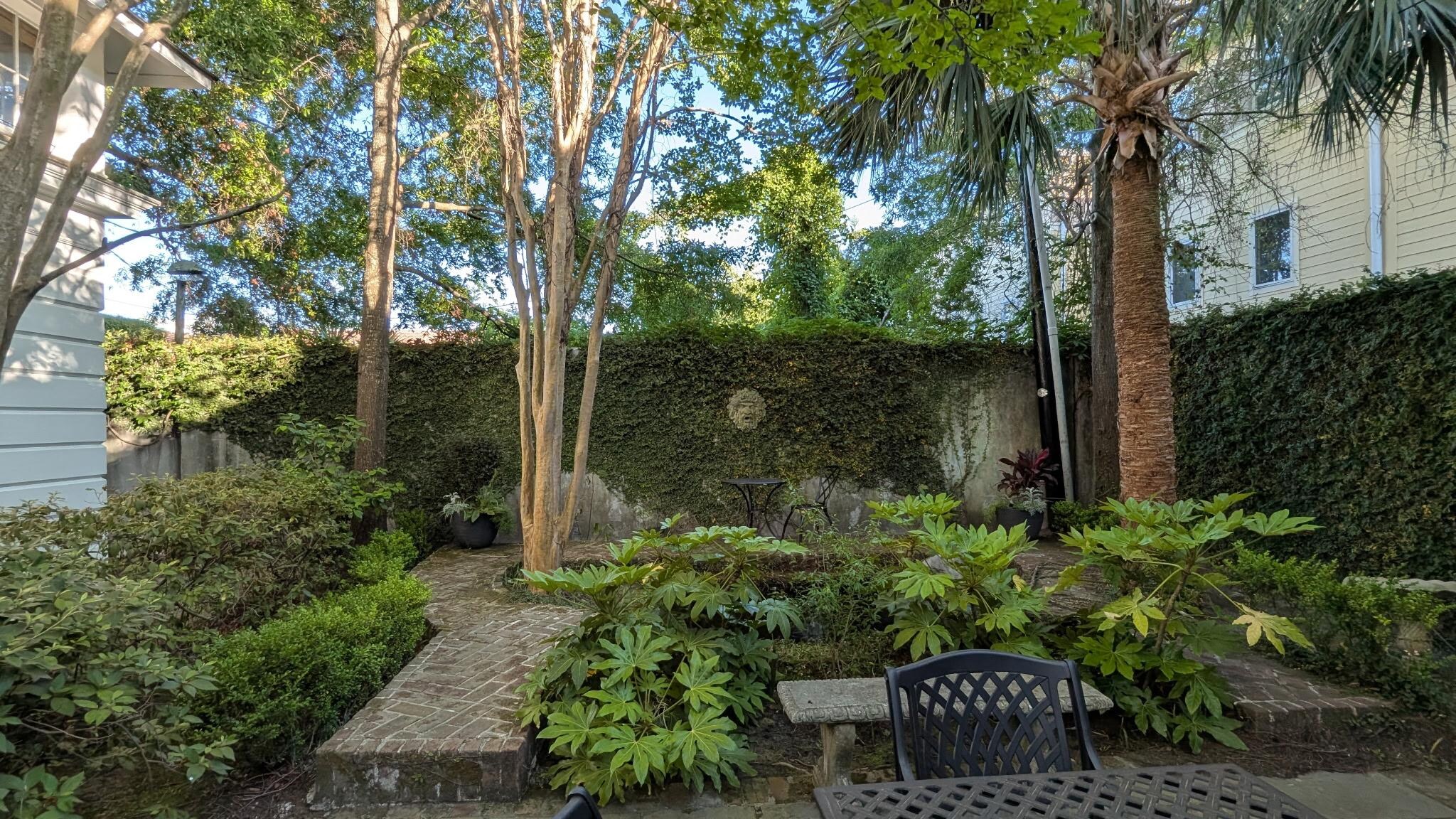 Courtyard with multiple fountains and a koi pond!