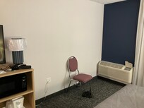 Conference chairs instead of table or chair like most hotels