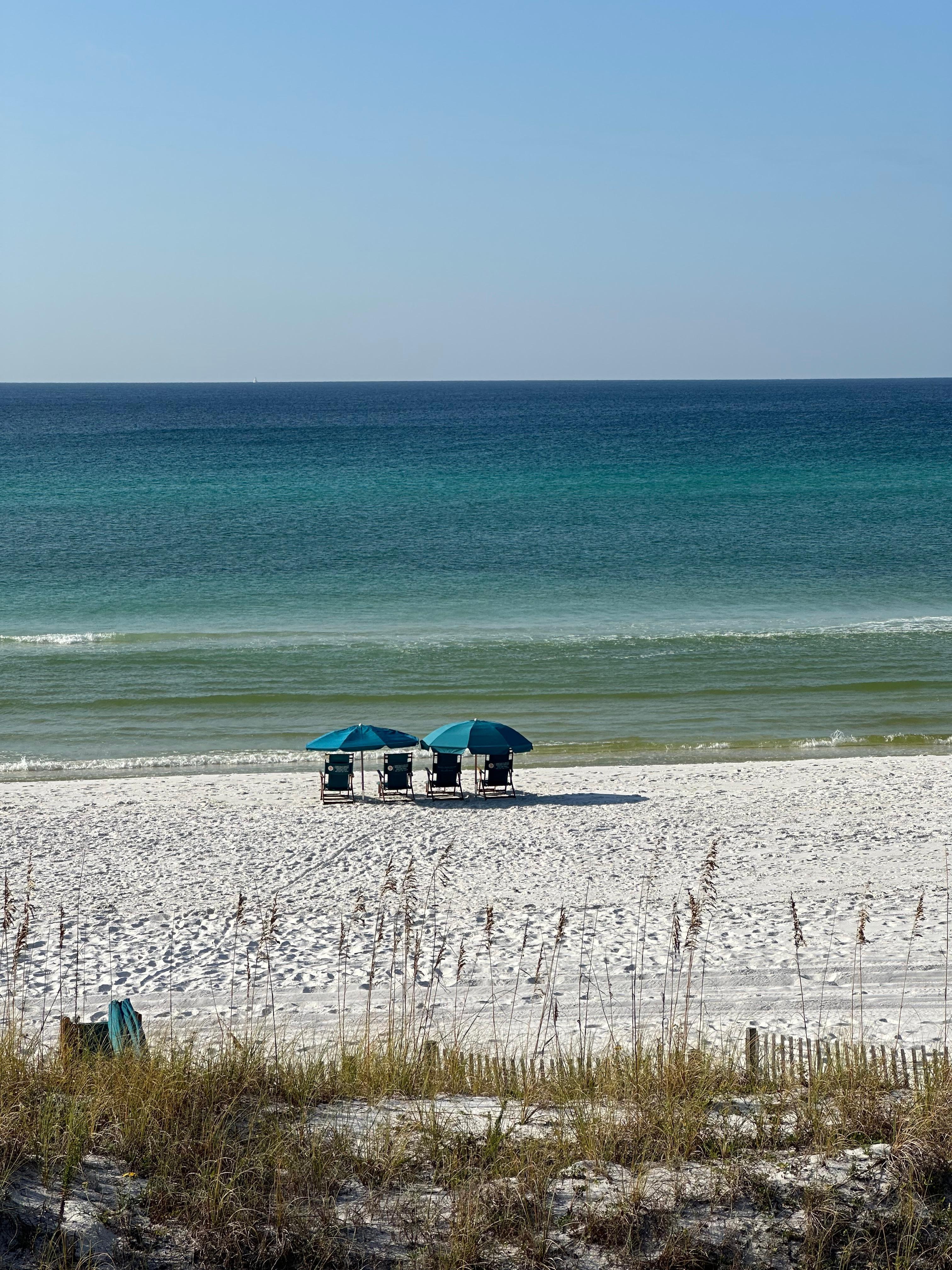Our 4 chairs/umbrella setup provided with rental