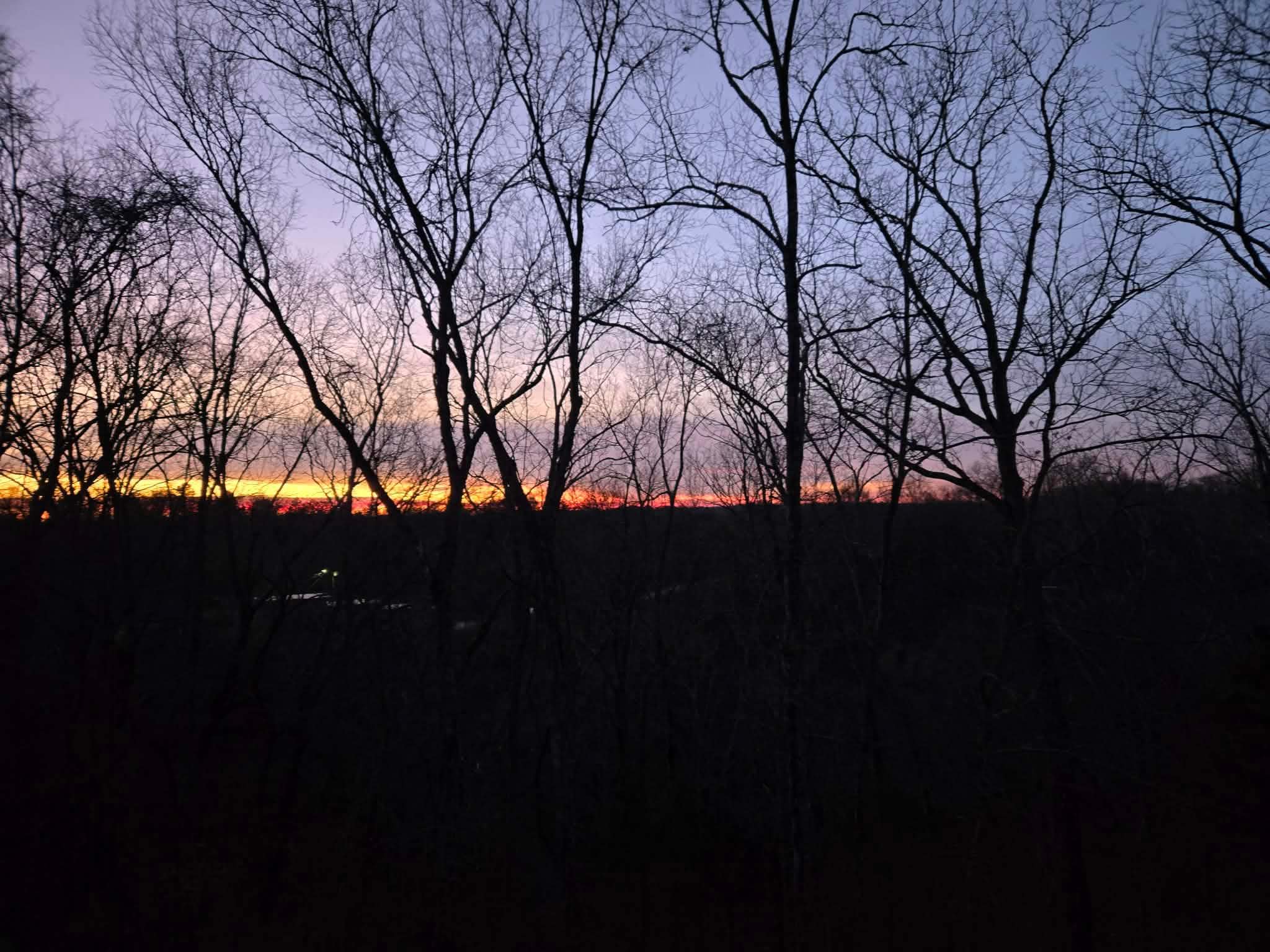 View of the sunset from the front porch.