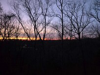 View of the sunset from the front porch.
