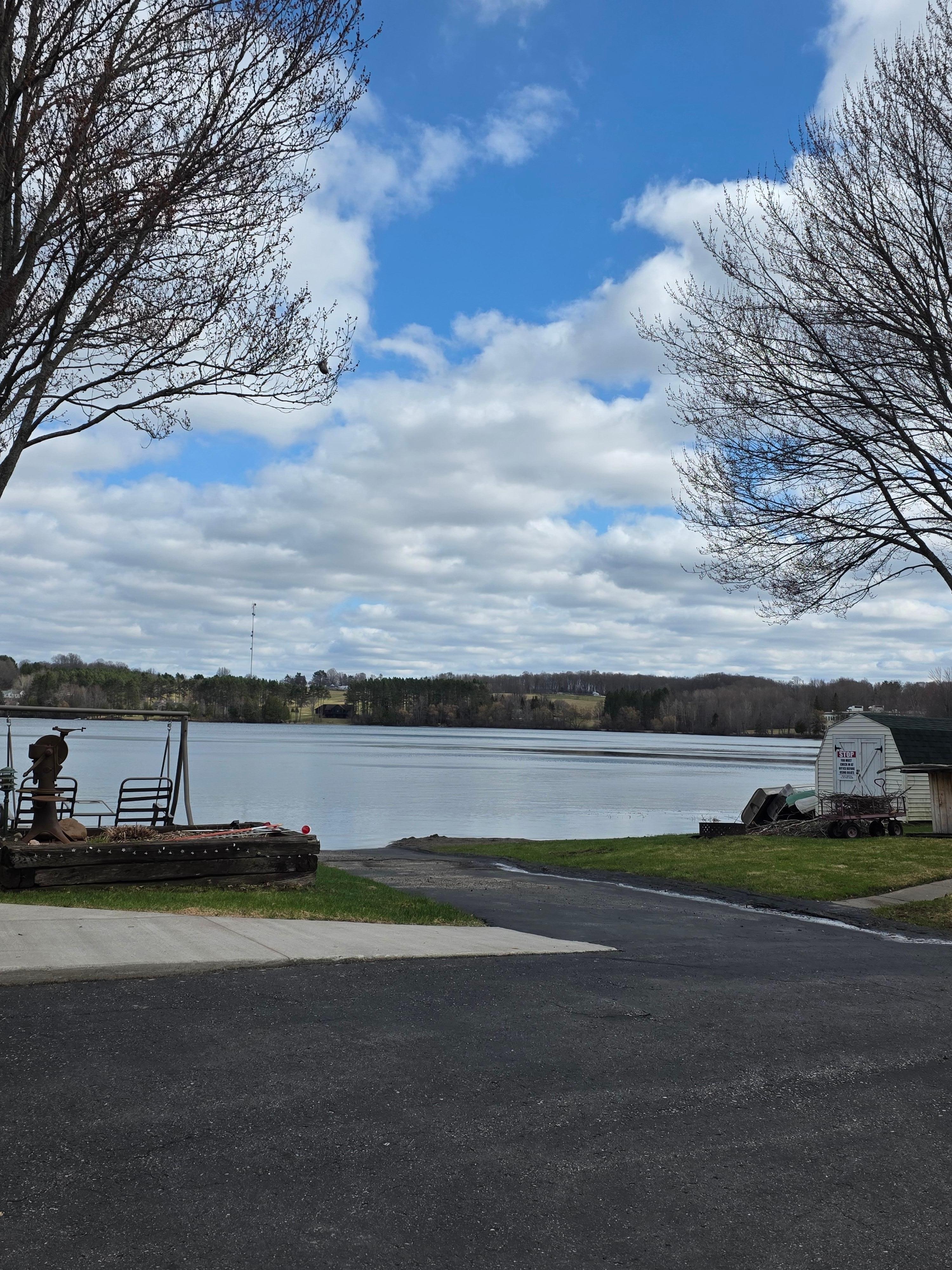 The view of the lake from the parking lot. You're on the shore.