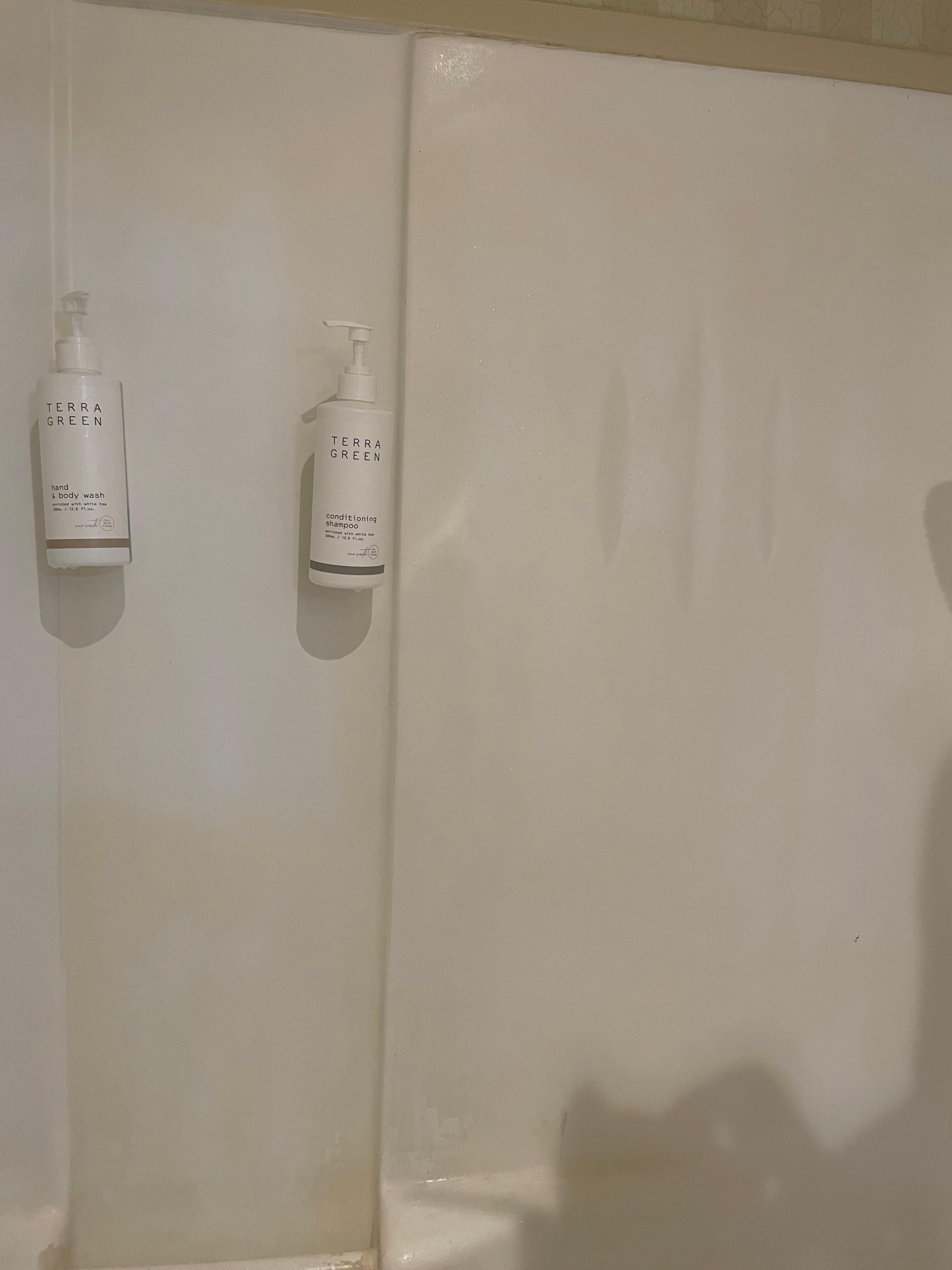 Stains on the shower walls.