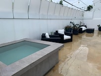 The shared outdoor area and mini Jacuzzi