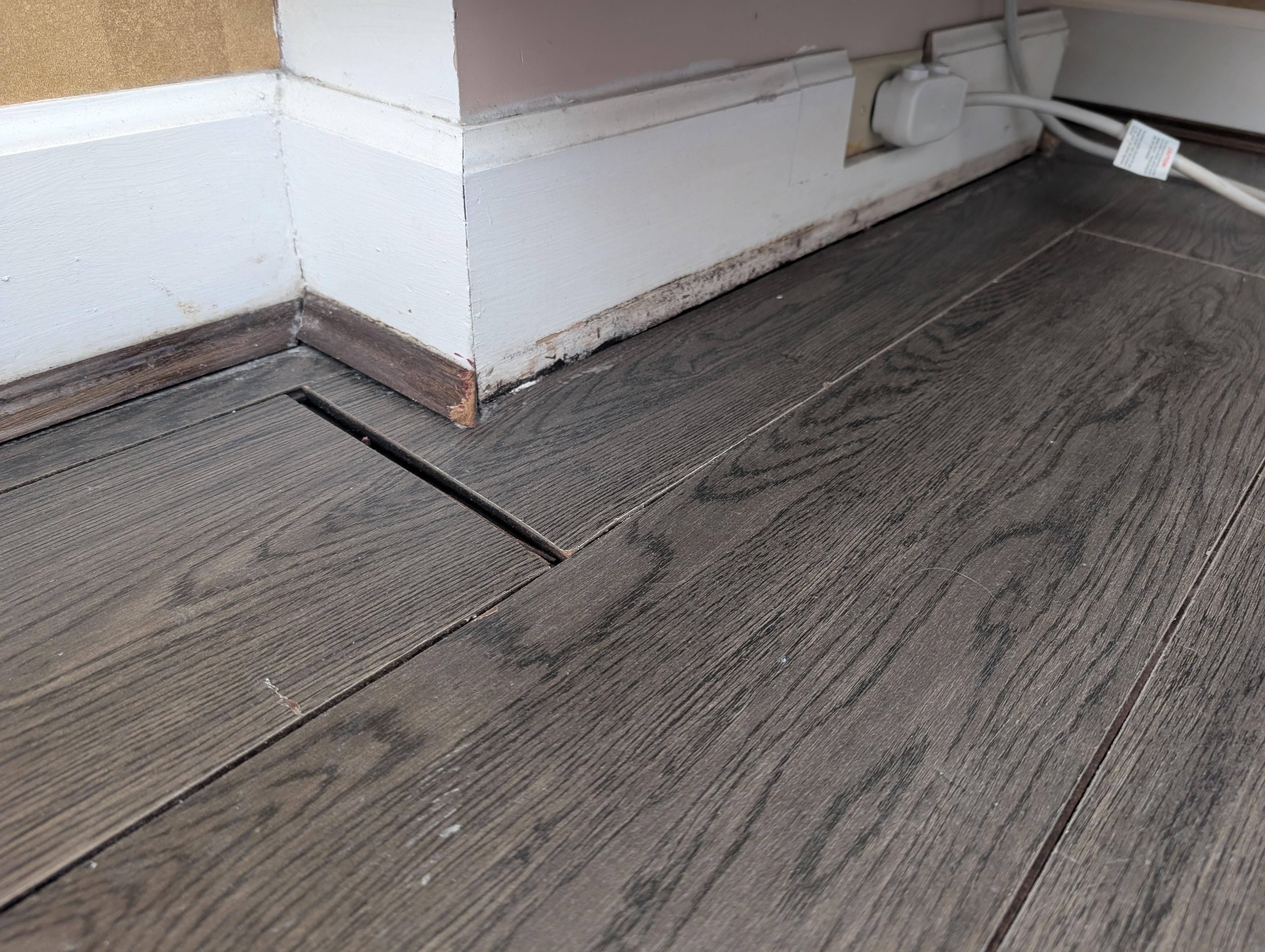 Old water damage below the AC.