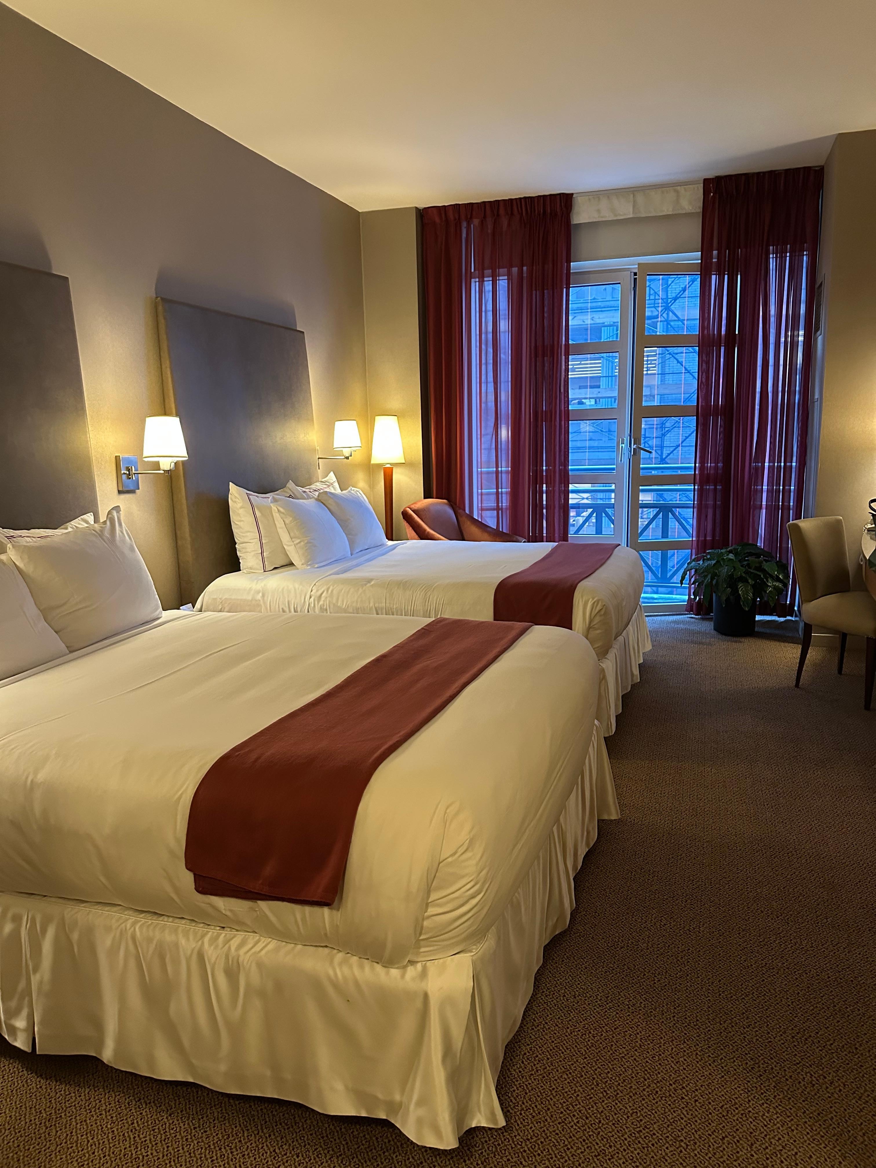 Spacious double queen room with 2 desks, drawers and ample closet. 